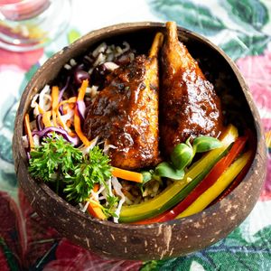 Stop by and treat yourself to our delicious plantain and brown stew chicken with a fresh! at Cafe Caye Mange in Yarmouth