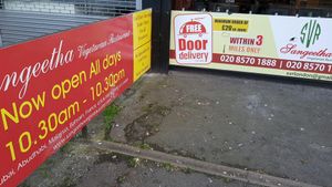 Signs at Sangeetha Vegetarian Restaurant in South West London