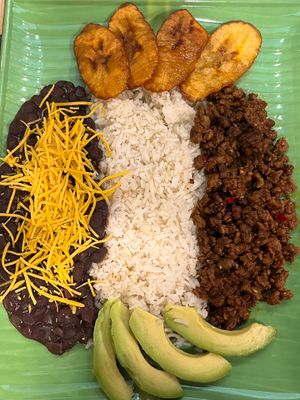 Pabellon Criollo: Ground "beef", black beans, avocado, plantain slices, white rice and shredded-ched vegan cheese on top of the beans at La Arepa in Portland