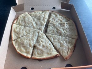 Vegan garlic bread (with vegan cheese)  at Rattle N' Hum Bar and Grill in Cairns
