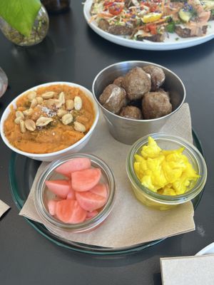 Vegan köttbullar with sides  at FIKA LAB in Leuven