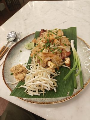 Spicy sausage pad Thai (sausage slices hidden below) at Kem-Kon Pahurat (เข้ม-ข้น พาหุรัด) in Bangkok