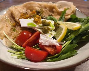 special of the night...arugula salad with vegan cheese and capers paired with a savory pancake and vegan caviar.  at Lutra Lutra Bar in Tbilisi