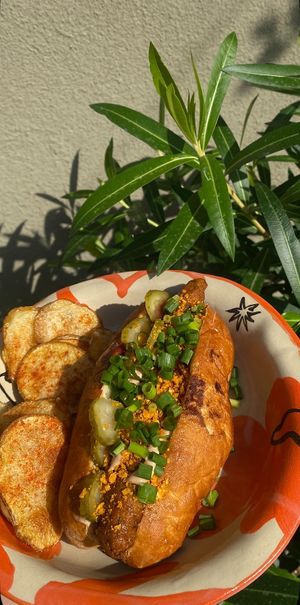 VEGAN HOT-DOG • 20 GEL

Composition:
• fresh bun from @stricha.tbilisi
• self made seitan sausage
• pickle
• green onion
• barbecue sauce
• tkemali
• aiol  at Lutra Lutra Bar in Tbilisi