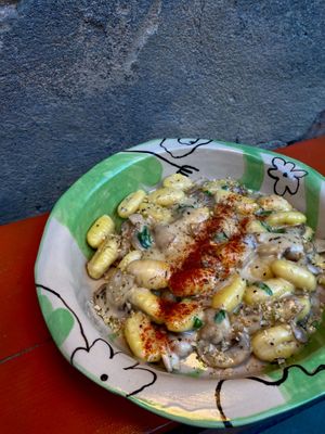 GNOCCHI WITH CHEESE MUSHROOM SAUCE
gnocchi, mushroom, vegan cheddar, coconut cream, arugula at Lutra Lutra Bar in Tbilisi