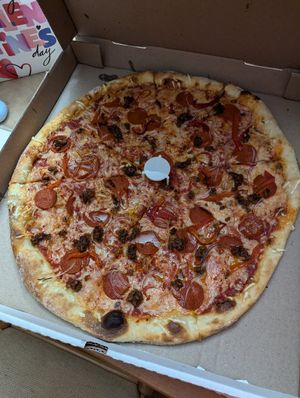 Vegan Supreme Pizza with no mushrooms + violife at Pizza Delicious in New Orleans