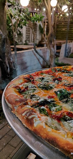 Vegan vodka sauce pizza with extra vegan cheese at Pizza Delicious in New Orleans