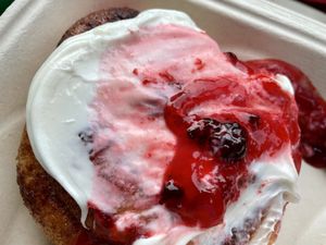 Cinnamon roll with frosting and berries   at Two Sisters Bakery in Corvallis