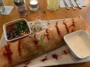 Peanut dosa with a side of lentil soup at Goura Pakora in Berlin
