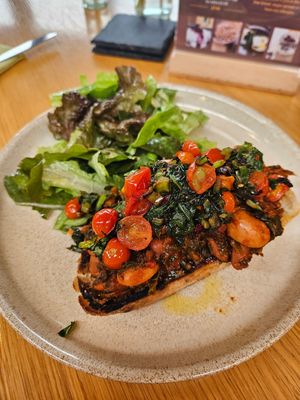 Beans on toast, asked for tomatoes and greens to be added at FarmED in Chipping Norton