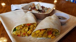 No Meato Burrito ($14), vegan by default. Tasty chickpea wrap w/rosemary potatoes on the side. at Cafe Coco in Washburn