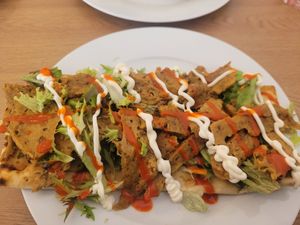 Seitan Kebab Served on Pitta Bread with Salad at Pip & Oat in Llandudno