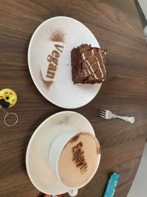 Chocolate orange traybake “delicious “ put the five year old in a cake stupor!  at Pip & Oat in Llandudno