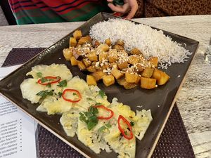 Tofu, potatoes and eggplant is some peanut sauce at Vegafe - Totoriu g. in Vilnius