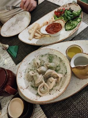 Koldunai starter and celery fries with salad at Vegafe - Totoriu g. in Vilnius