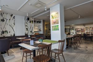 Cute with shop on back wall at Vegafe - Totoriu g. in Vilnius