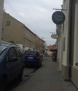 Vegcafe and RawRaw restaurants have the same entrance at Vegafe - Totoriu g. in Vilnius