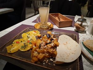 Trio of tofu aubergine potatoes with ginger tea at Vegafe - Totoriu g. in Vilnius