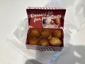 Box of Lukamades at ATH - Lukumades in Athens