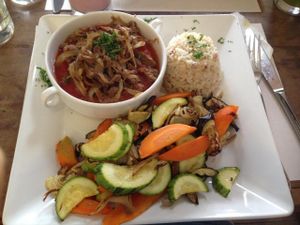 Polenta with vegetable meat with tomato sauce plus whole rice and grilled vegetables and mushrooms. at Taste and See in Sao Paulo