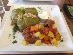 Cabbage rolls with brown rice plus soy steak. at Taste and See in Sao Paulo