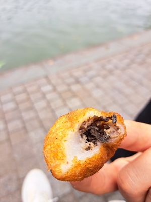 Tastes salty, but weren't sure, if there was chicken inside. at Hải Xệ - Bánh Rán Cao Lâu in Hanoi