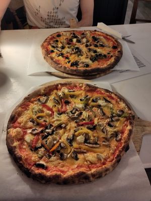 Spring pizzas, one without the olives at Giovanni's Caffe' and Pizzeria in Cambridge