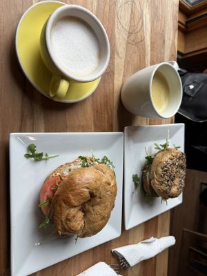 oatmilk cappuccino, maca matcha, vegan bagels with cream cheese, arugula, tomato and red onion.   at Cafe Joust  in Catskill
