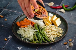 Gado Gado – vegetables, tofu and peanuts sauce.
Tofu, carrots, green beans, mung bean sprouts, cabbage, lontong (rice). Sauce: peanuts, tomatoes, garlic, hot chilli, sweet soy s at Taste of Bali in Timisoara