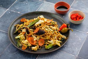 Stir-fired noodles with vegetables – Mie goreng sayur.
Wheat flower noodles, egg, mangetout peas, cauliflower, cabbage, mung bean-sprouts, green onions, carrots, wood ear mushro at Taste of Bali in Timisoara
