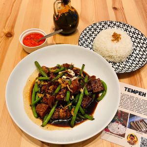 Tempeh (soy) sautéed with green beans, shallots, garlic, candlenuts, sweet soy sauce, white pepper, salt.  at Taste of Bali in Timisoara