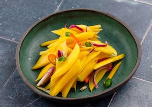Mango salad: gren mango, a bit of cayenne chili peppers, shallot, salt. at Taste of Bali in Timisoara