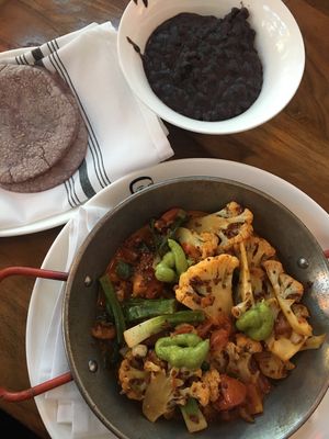 Cauliflower annatto paella 
Black beans without the cheese on the side at Mandalay Bay Hotel - Border Grill in Las Vegas