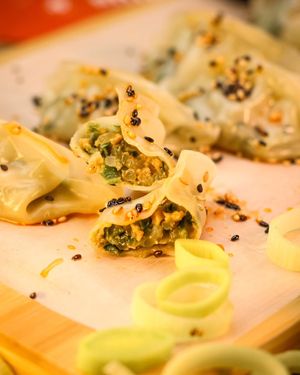 Leek gyozas with soy meat, toasted sesame, and sichuan pepper oil at Shlen - Salamanca in Madrid