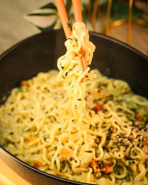 Creamy Pot Aromatic Noodles with vegetables, creamy curry sauce, and coconut milk at Shlen - Salamanca in Madrid