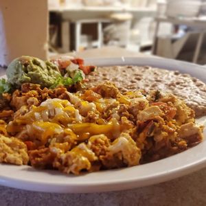Vegan Chorizo tofu scramble with beans, pico, and guac. at Dinner Bell Cafe in Prescott