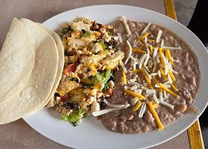 Tofu scramble with refried beans instead of potatoes.  at Dinner Bell Cafe in Prescott