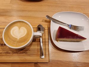vegan cheesecake and plant-milk cappuccino at Madal Cafe in Budapest