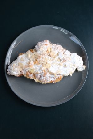 Vegan almond croissant with almond cream filling at The Artisan Baker in Cheltenham