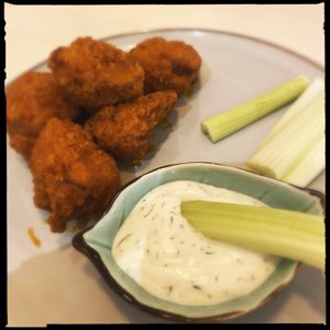 Cauliflower + buffalo sauce! Mmm!  at Loving Vegan  in Hafnarfjordur