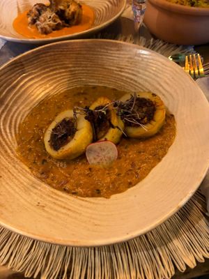 Filled potatos with veggies swimming on massala cream  at BlendHouse in Utrecht