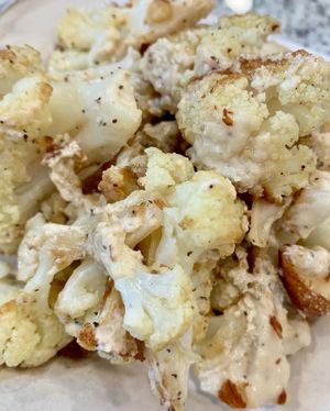 Cauliflower side salad with tahini dressing - very good! at Urban Deli in Savannah