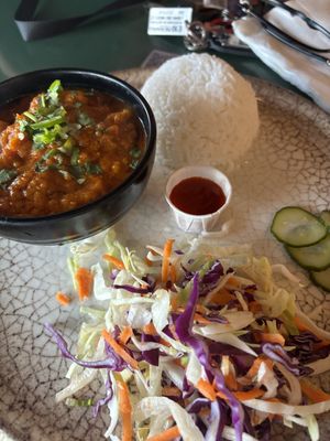 Pumpkin curry and rice with salad   at Kargo MKT in Salford