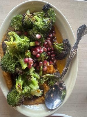 Charred broccoli with pumpkin and pomegranate   at Safta in Denver