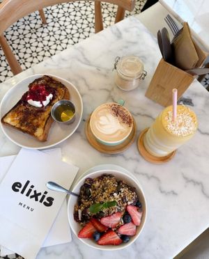 Brunch Spread - creme brûlée brioche French toast, yoghurt and granola bowl, golden glow superfood smoothie, specialty coffee at elixis  in South West London