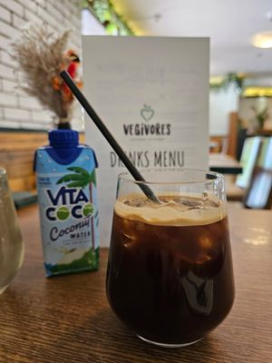 Iced coffee and coconut water at Vegivores  in Bournemouth