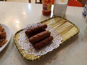 Vegan sausages. The meat part is nice and somehow sweet, but some white part inside felt a little like solid fat and ruined the experience. 6/10 at Jade Buddha Vegetarian 玉佛寺素斋馆 in Shanghai