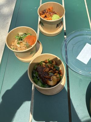cucumber, broccoli, and carrot sides (bottom, middle, top)  at Kernel in New York City