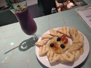 Jalapeno hummus. Very good. Not spicy. Awesome  Blueberry nights smoothie 😋🥤 at The Good Food Co. in Phnom Penh