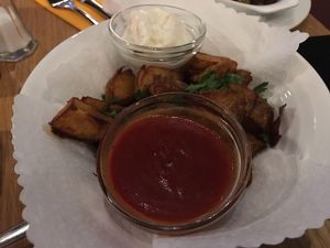 oven potatoes with alioli and homemade ketchup at Chimichurri in Frankfurt